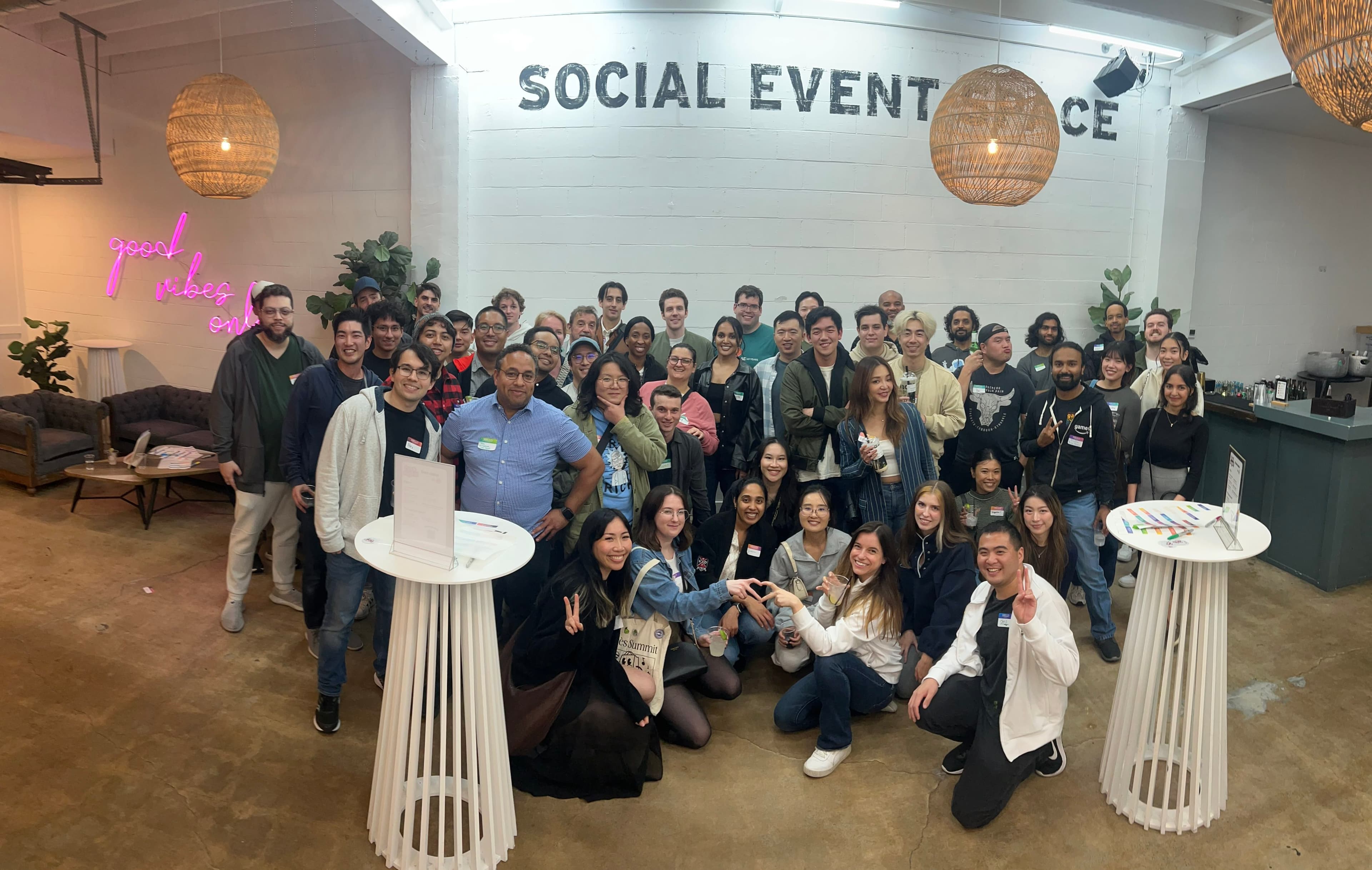 Friends gathered for a group photo at a tech night social